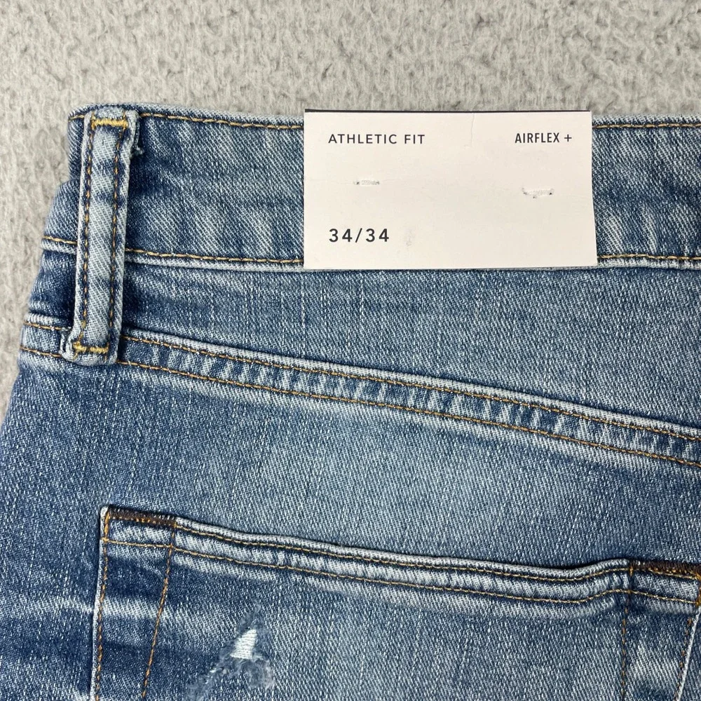 American Eagle Jeans Mens 34x34 Blue Athletic Fit Distressed Stretch Airflex NEW